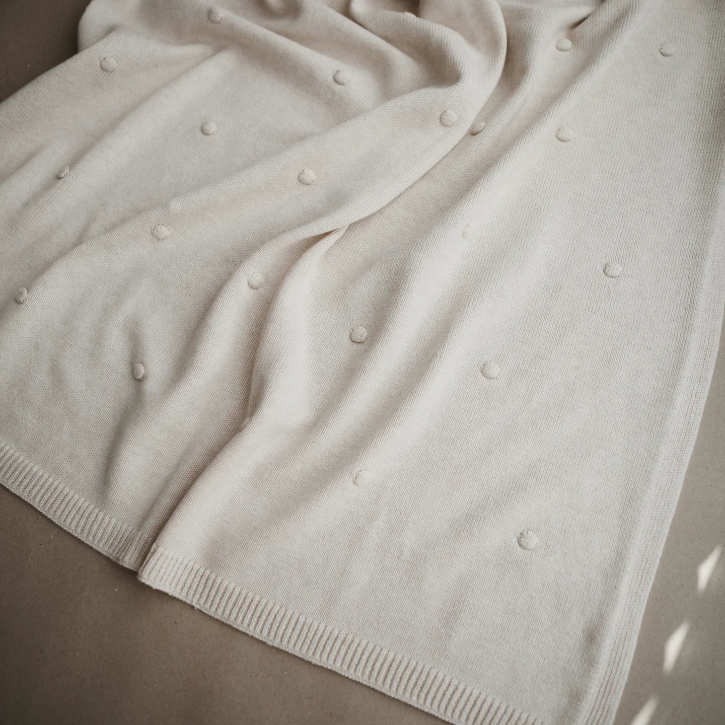 Mushie Off White Textured Dots Blanket